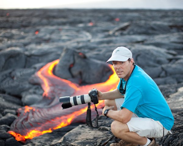 Mark photographing active lava flow in Hawaii