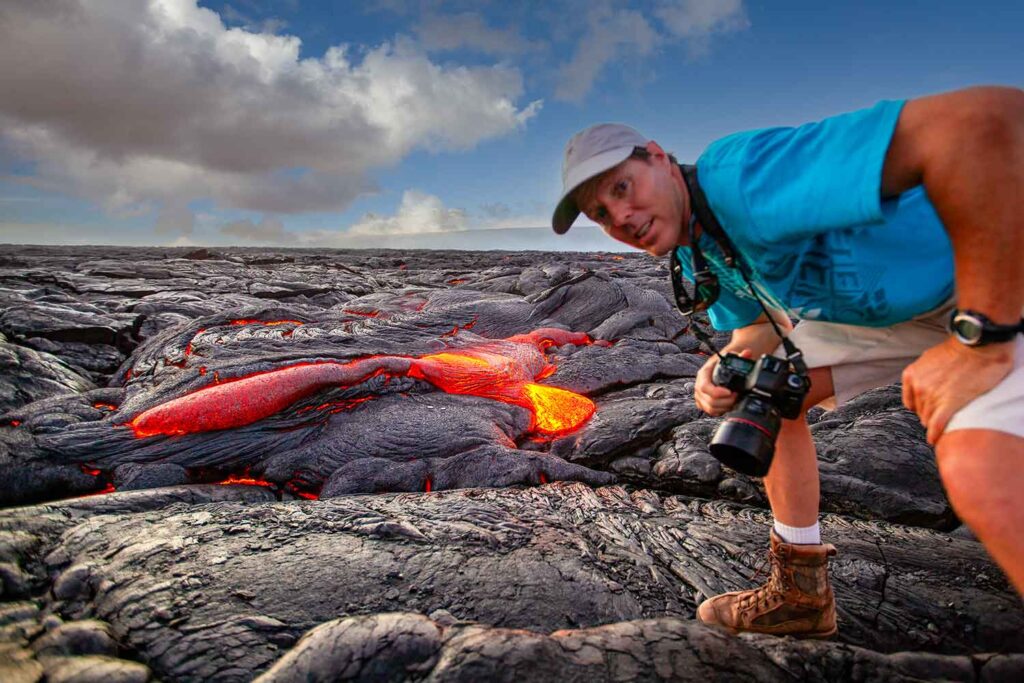 Brace for the heat as Mark captures the raw power of active lava at Hawaii's volcanoes—nature's fiery symphony frozen in time.